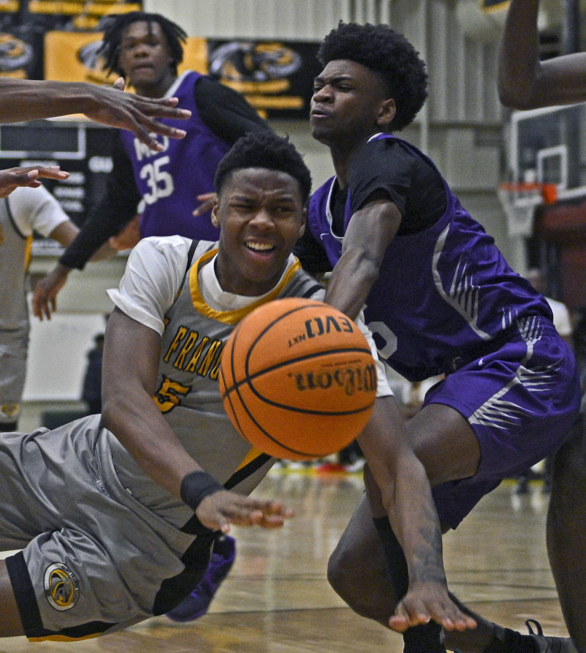 Mount Saint Josephâs Chauncey Word, right, fouls St. Francesâ Carter...