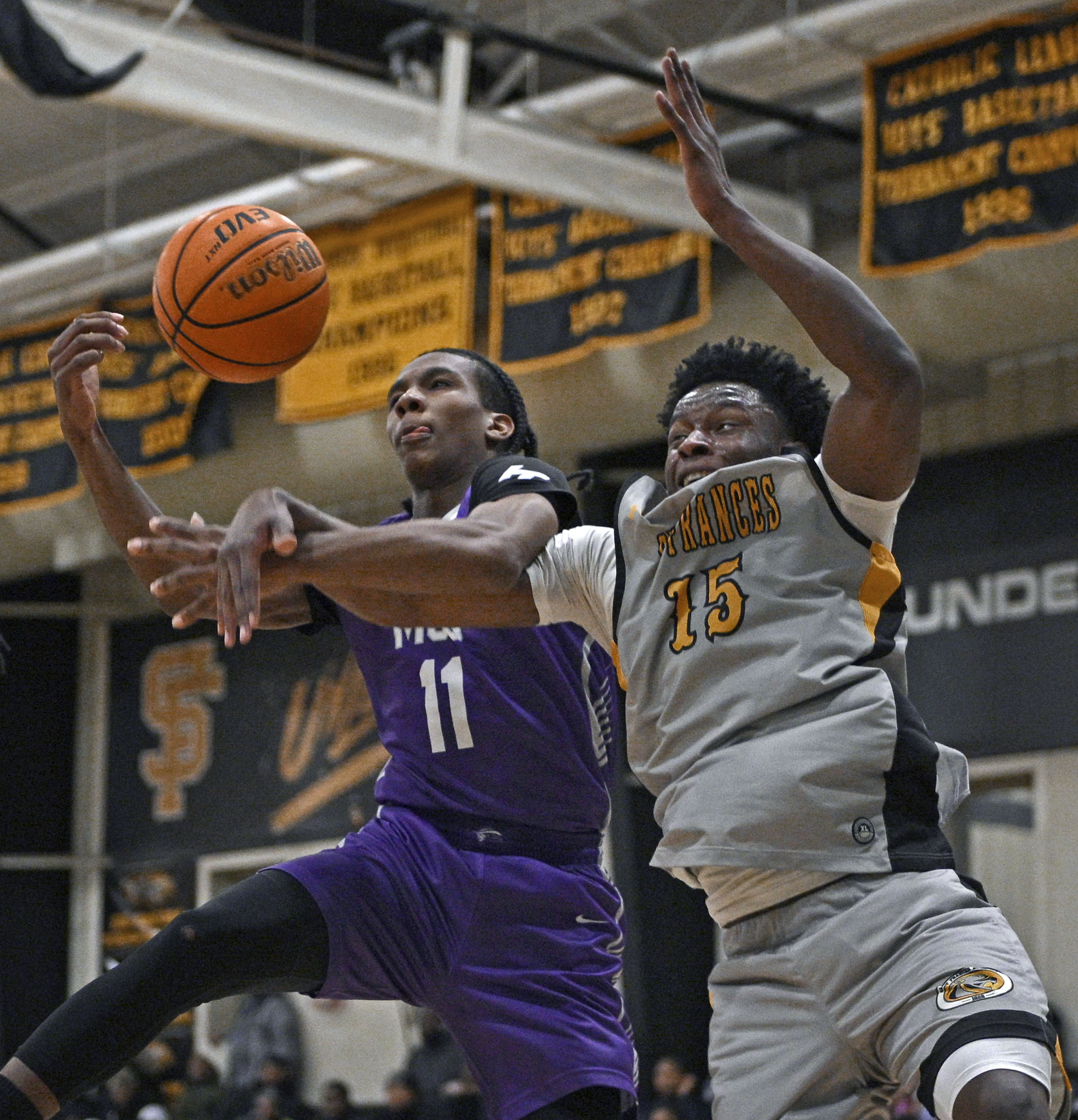 St. Francesâ Anthony Smith, right, fights for the ball against...