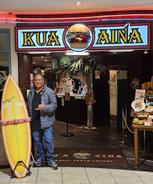 On his first trip to Japan, Michael Gamiao of Honolulu saw reminders of home at Kua Aina restaurant in Naniwa ward, Osaka. Photo by Renee Gamiao.