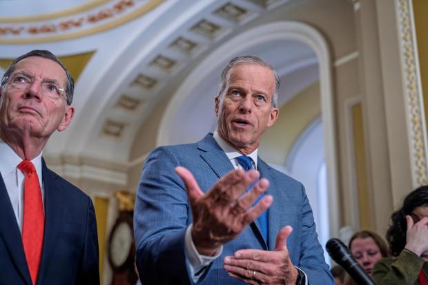 Senate Majority Leader John Thune, R-S.D., joined at left by Sen. John Barrasso, R-Wyo., the GOP whip, reflects on President Donald Trump's State of the Union address as he meets with reporters at the Capitol in Washington, Wednesday, Feb. 25, 2026. (AP Photo/J. Scott Applewhite)