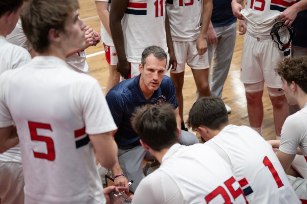 Chaparral High School head coach Nate Rohnert draws up plays for the team during a Class 6A second round playoff game against Fairview High School on Friday, Feb. 27, 2026, at Chaparral High School in Parker, Colo. (Photo by Timothy Hurst/The Denver Post)