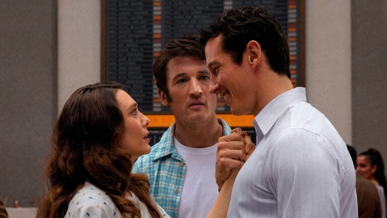 Elizabeth Olsen, Miles Teller and Callum Turner in "Eternity," now streaming on Apple TV.