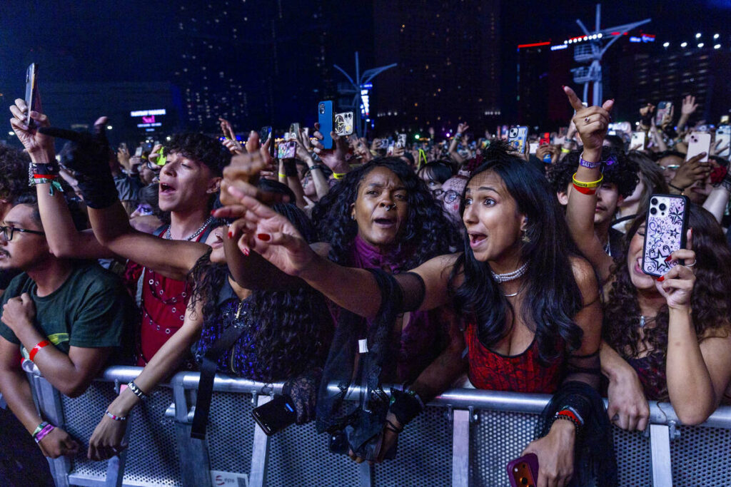 Fans sing along with Panic! At The Disco performing on the 7-Eleven stage during the When We We ...