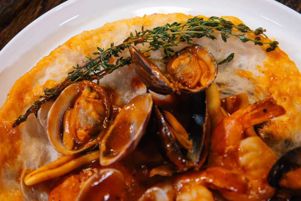 Cavetelli Al Frutti Di Mare Al Forno Milano is served at Milano in Town Square Friday, Jan. 30, ...