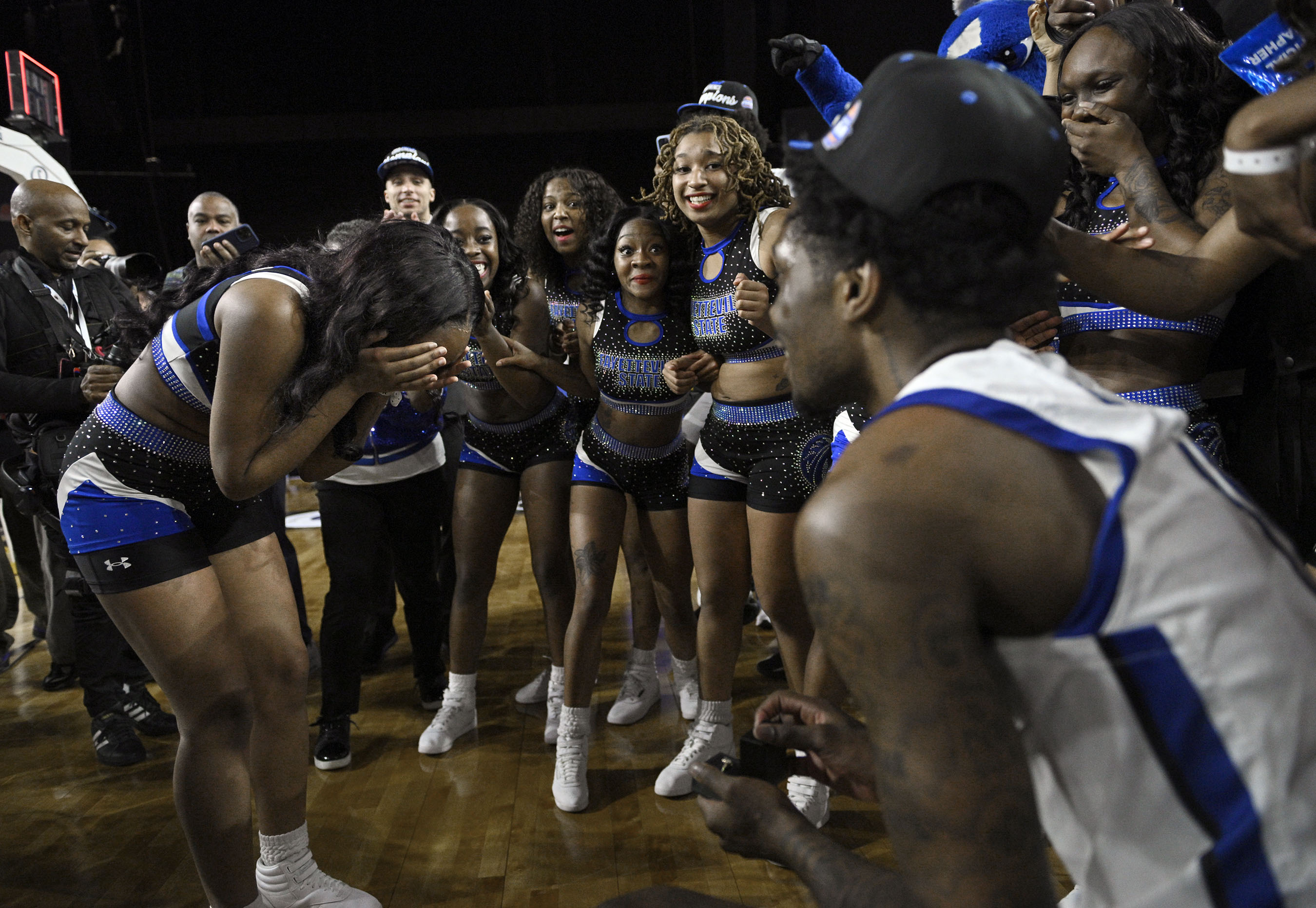 Fayetteville Stateâs Ezekiel Cannedy, right, kneels to propose to girl...