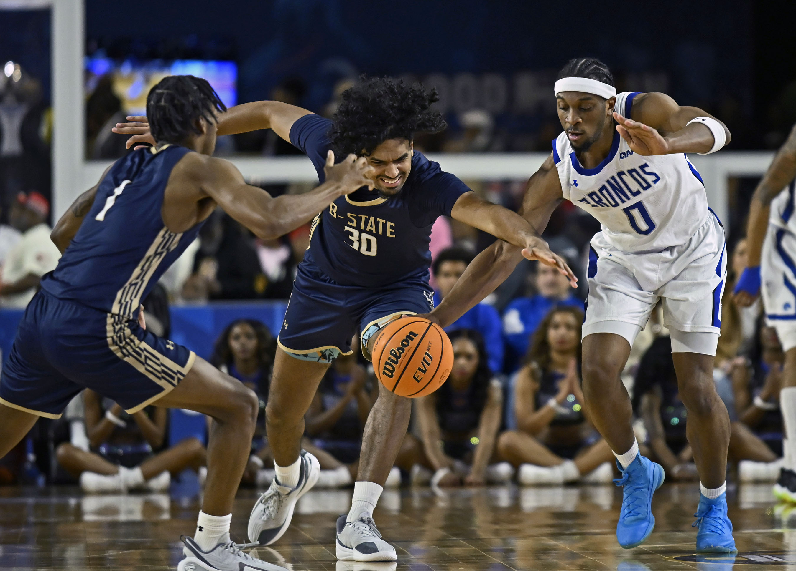 Fayetteville Stateâs Romeo Aquino, from right, steals the ball from...