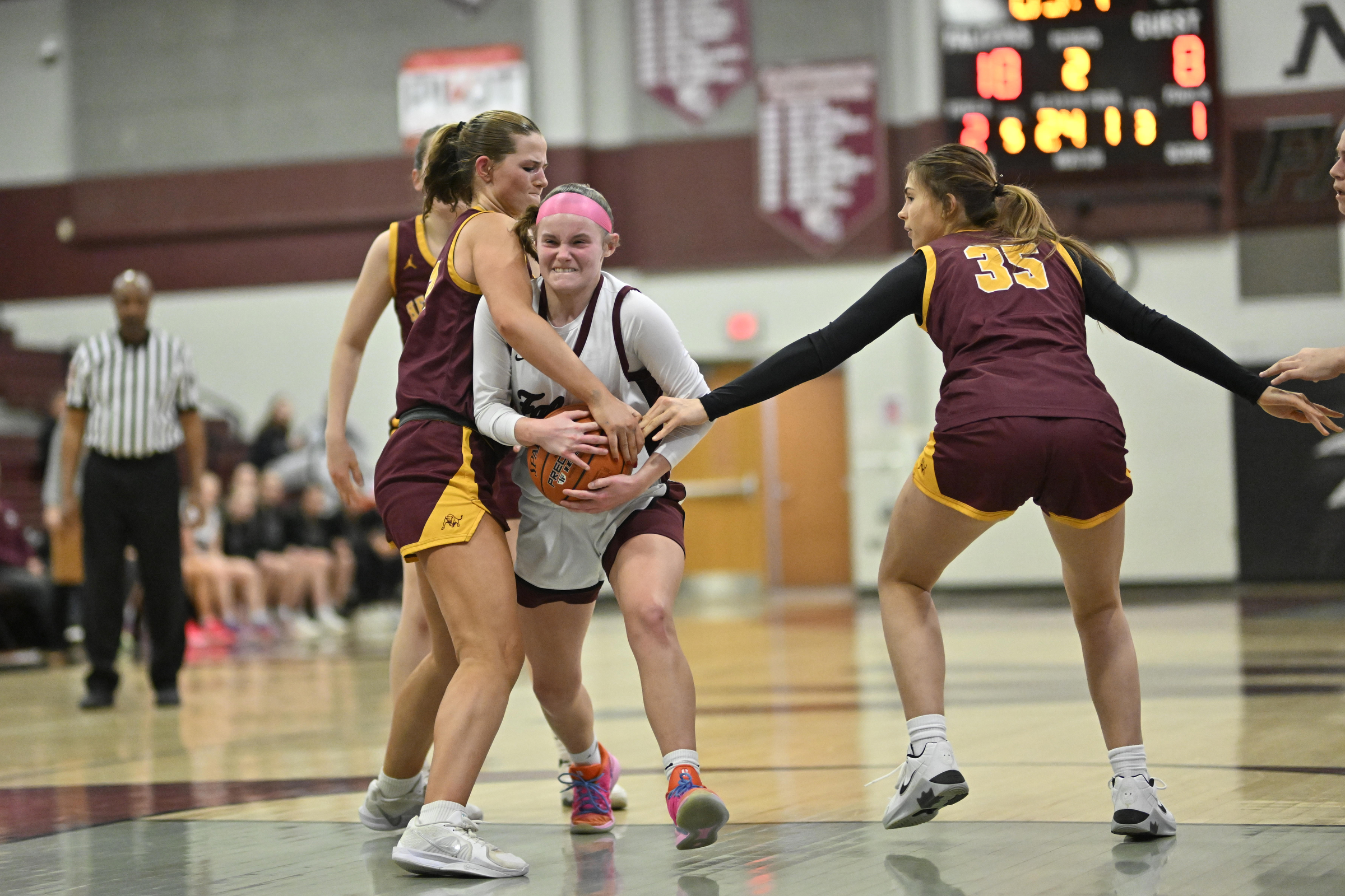 Riley Hollinger tries to split Herfordâs defense during a playoff...
