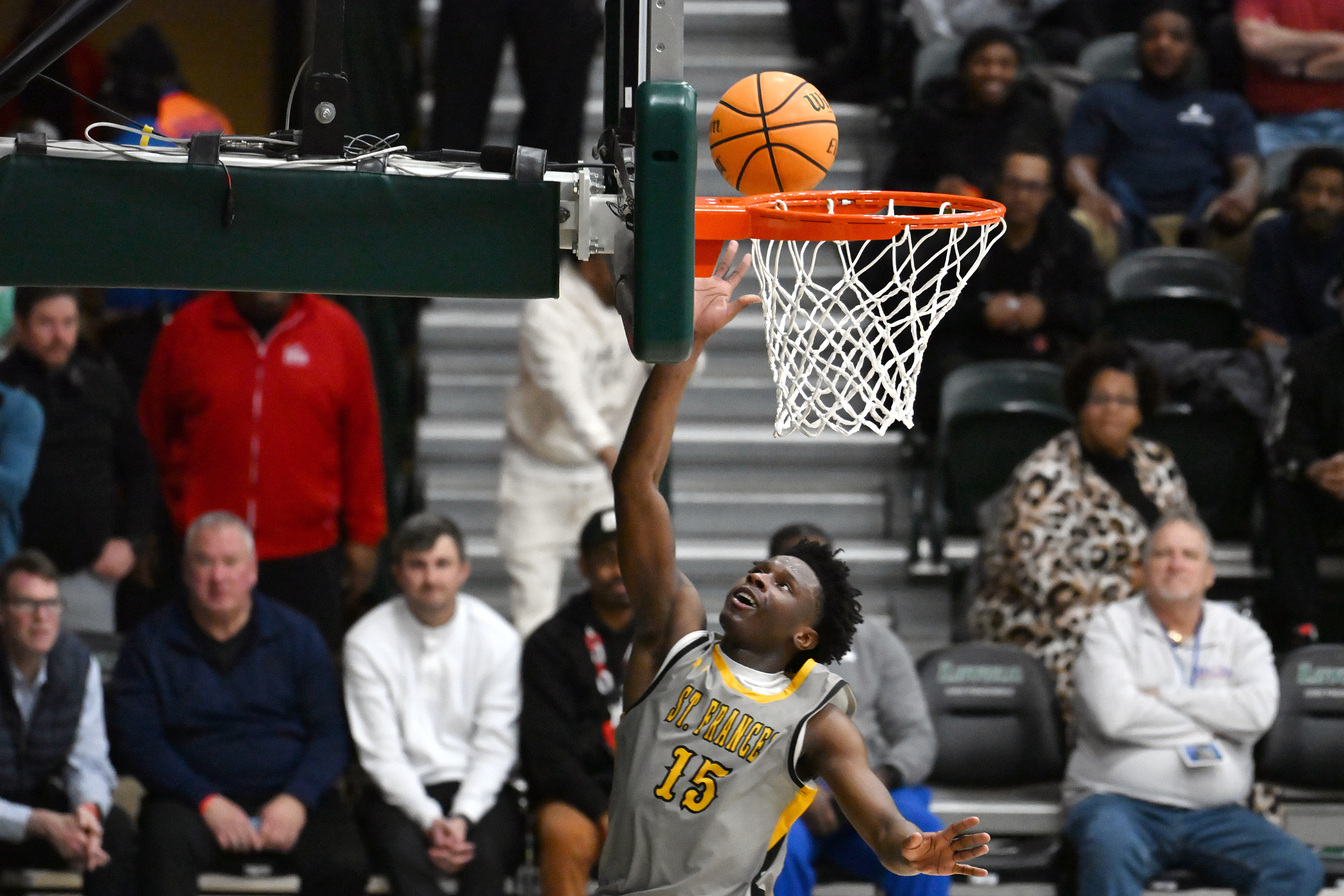 St. Frances' Anthony Smith scores in the second half of...
