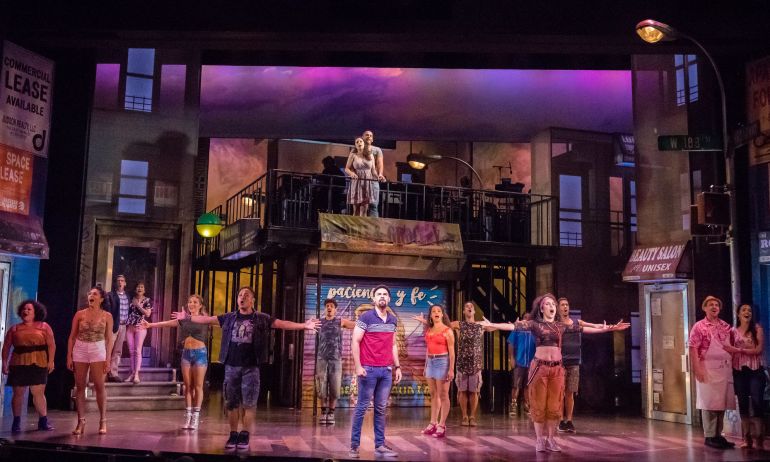 Theatrical cast on a stage