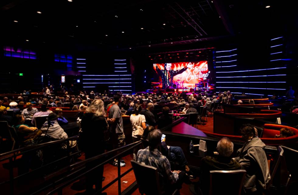 Attendees wait for the start of a Neil Diamond tribute show at the South Point Showroom on Wedn ...