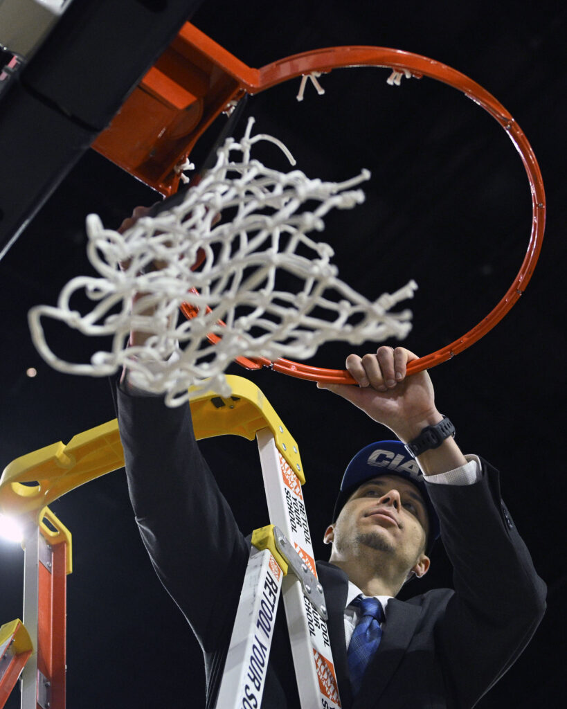 Fayetteville State head coach Devin Hern cuts down the game...