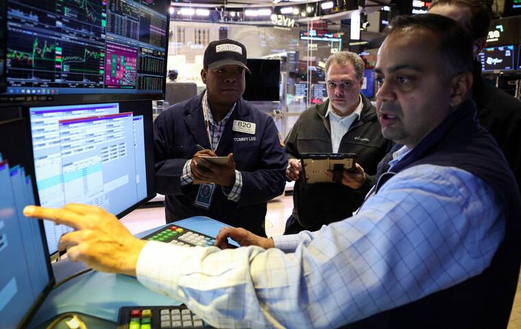 Wall Street closes down as oil prices spike