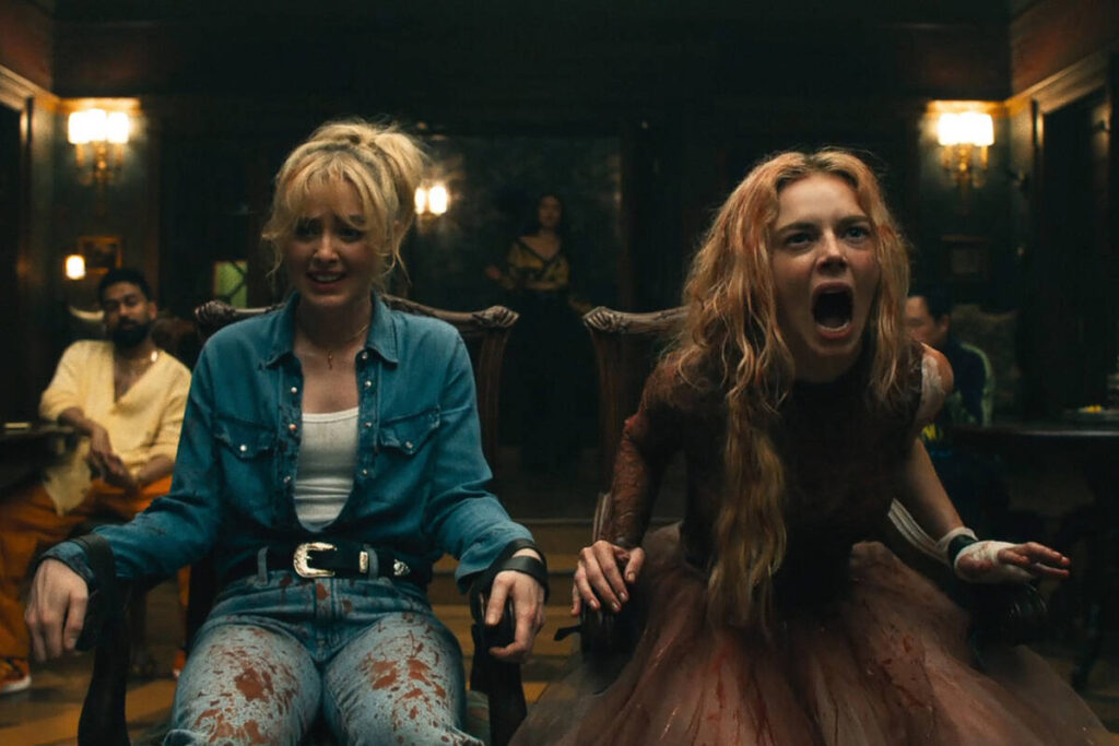 Kathryn Newton and Samara Weaving in "Ready or Not 2: Here I Come." (Searchlight Pictures)