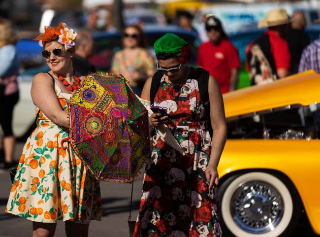 Attendees socialize during the Rockabilly Car Show at Viva Las Vegas Rockabilly Weekend on Satu ...
