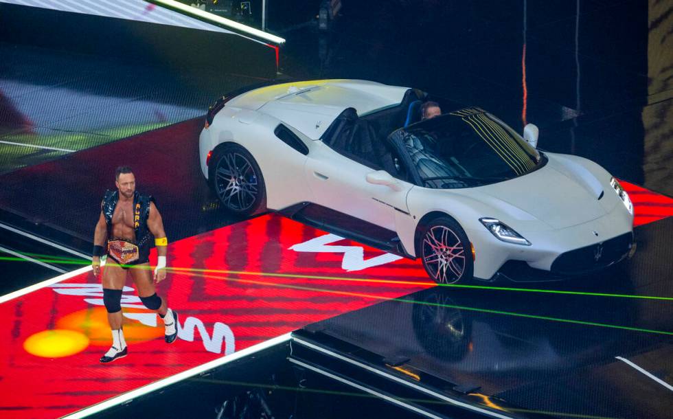 Shaun Ricker, now known as LA Knight, arrives via Maserati to battle Jacob Fatu during their Un ...