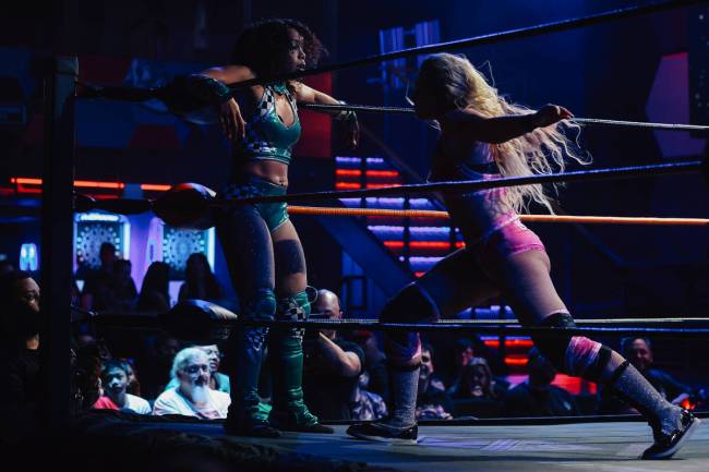 Mazzerati, left, is punched by Brittnie Brooks during a Future Stars of Wrestling match at the ...