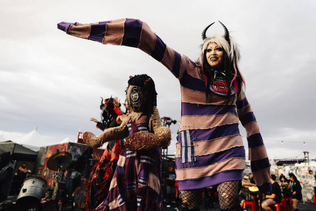Performers dance on stilts during the the Sick New World music festival at Las Vegas Festival G ...