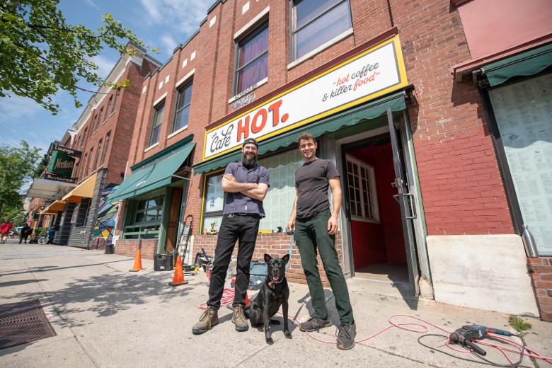 Travis (left) and Allan Walker-Hodkin at the Café HOT. in 2021