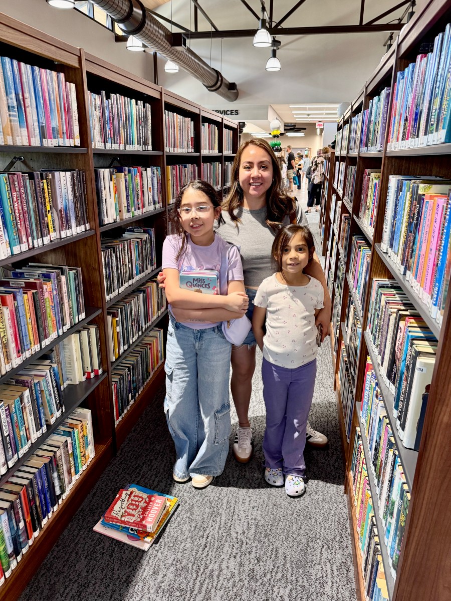 Win big prizes just by reading at Irondale Public Library this summer—it's free + fun 3 People of all ages participating in summer reading activities at the Irondale Public Library