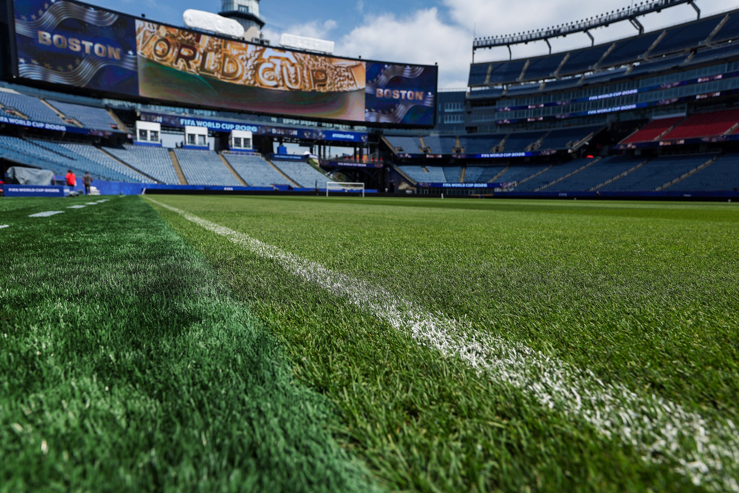 Natural grass on the playing pitch has replaced the synthetic turf that was on the field before. On the left you can see the synthetic turf where it ends before it meets the natural grass. Guided walk though of Gillette Stadium ahead of the first World Cup game being held there on Saturday. (Photo by: Barry Chin/Globe Staff).