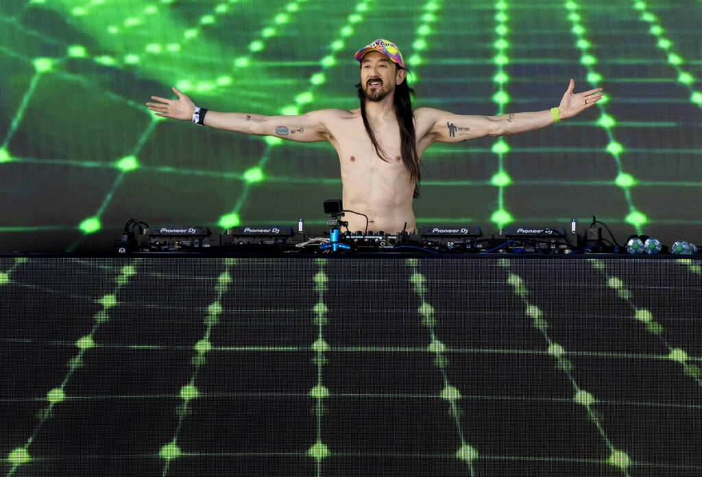 Steve Aoki performs on stage in Toshiba Plaza during the pre-game festivities before Game 6 of ...