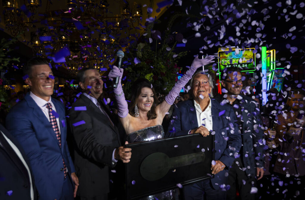 Lisa Vanderpump, center, celebrates as confetti goes off to celebrate the grand opening of The ...