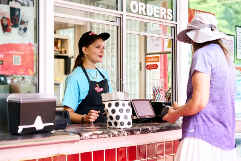 Juliette Froment takes frozen custard orders at Goodberry's in Cary. Photo by Matt Ramey.