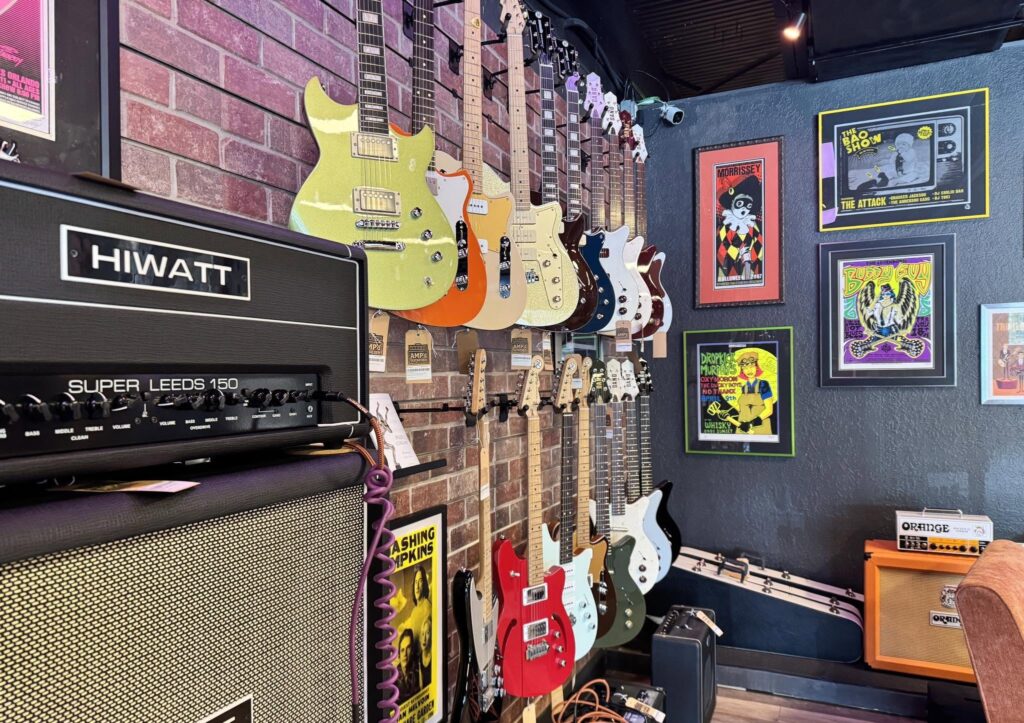 New Orlando-owned shop Amp'd Guitar Den opens in Mills 50