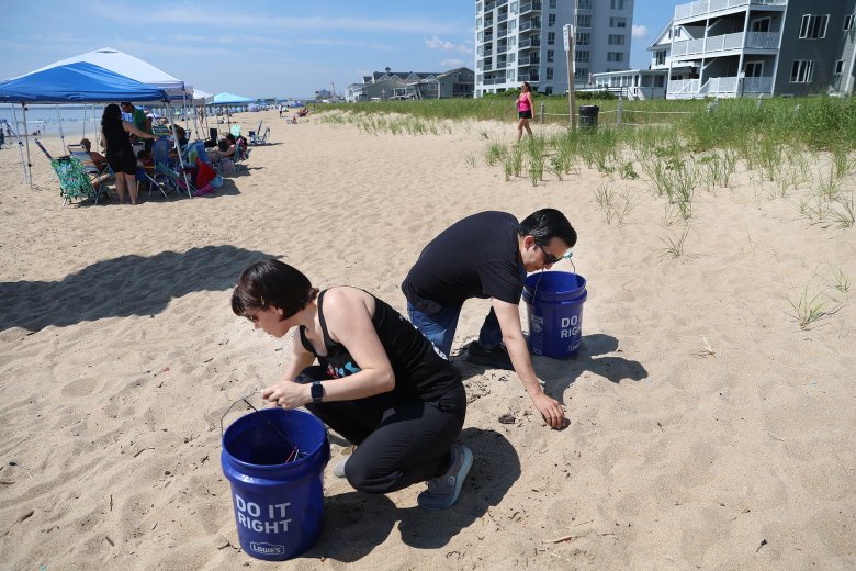 Volunteers at Old Orchard Beach keep the shore sparkling on the fifth of July