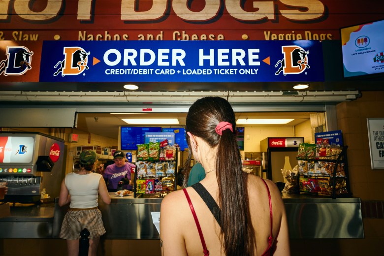 The author deliberates over an order at the Durham Bulls stadium. Photo by Matt Ramey.