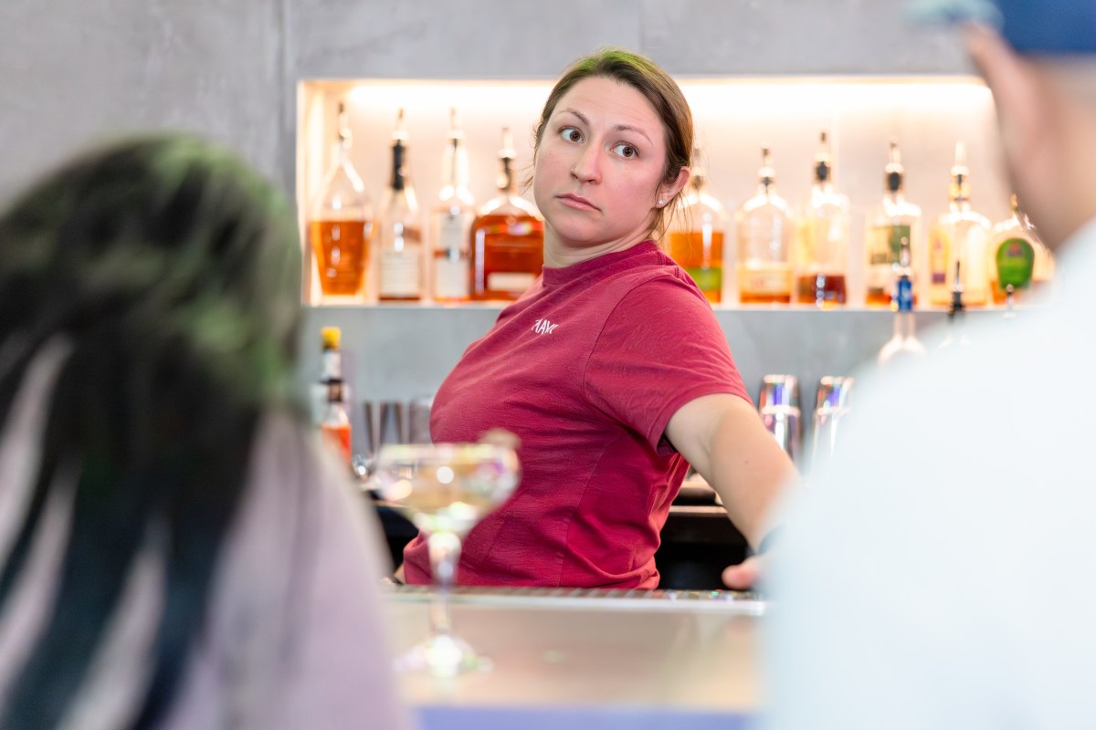 The FREE Birmingham event every restaurant owner should know about 3 bartender in red shirt serves up a cocktail