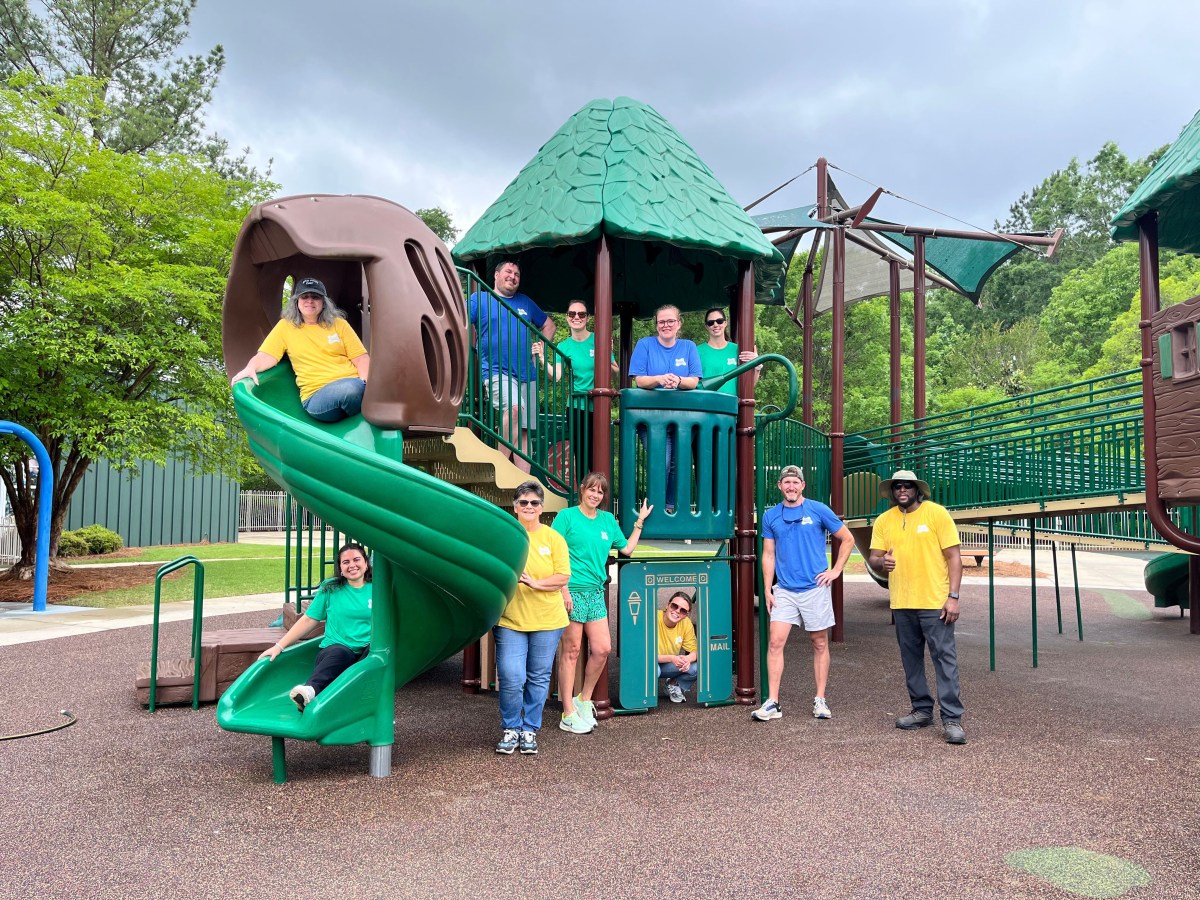 group of volunteers on a kids' playground