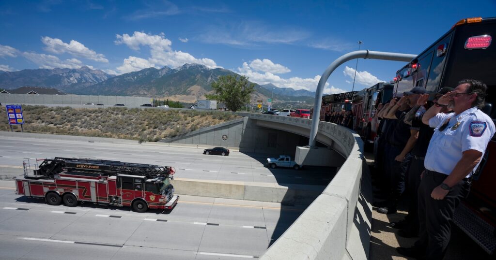 Utah firefighters line I-15 for Provo firefighter's family killed in flash flood