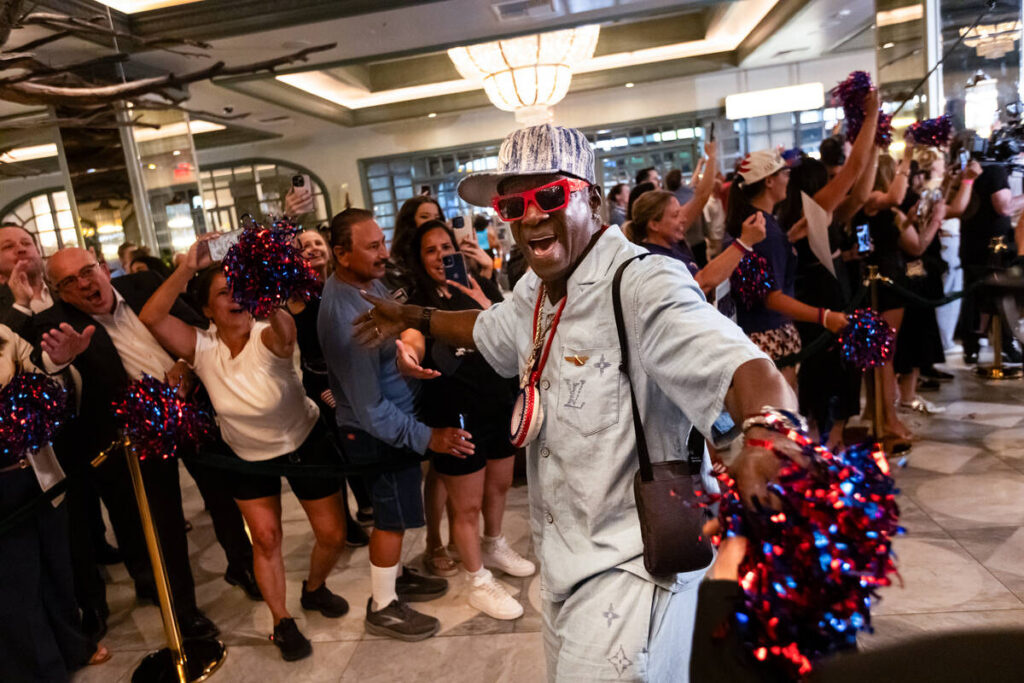 Flavor Flav leads the welcoming party for U.S. women Olympians as they arrive for SHE Weekend a ...