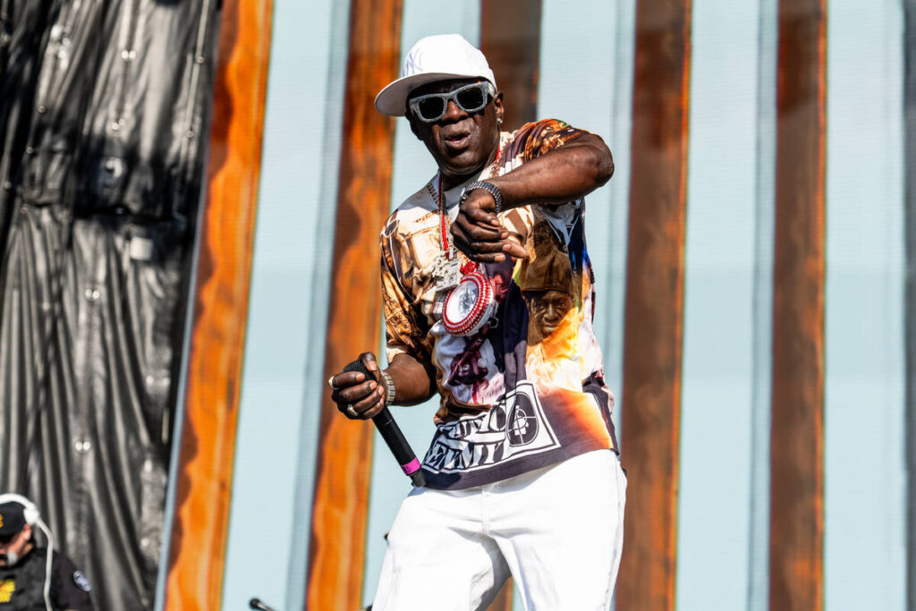 Flavor Flav, of Public Enemy, performs during Sonic Temple Art and Music Festival on Sunday, Ma ...