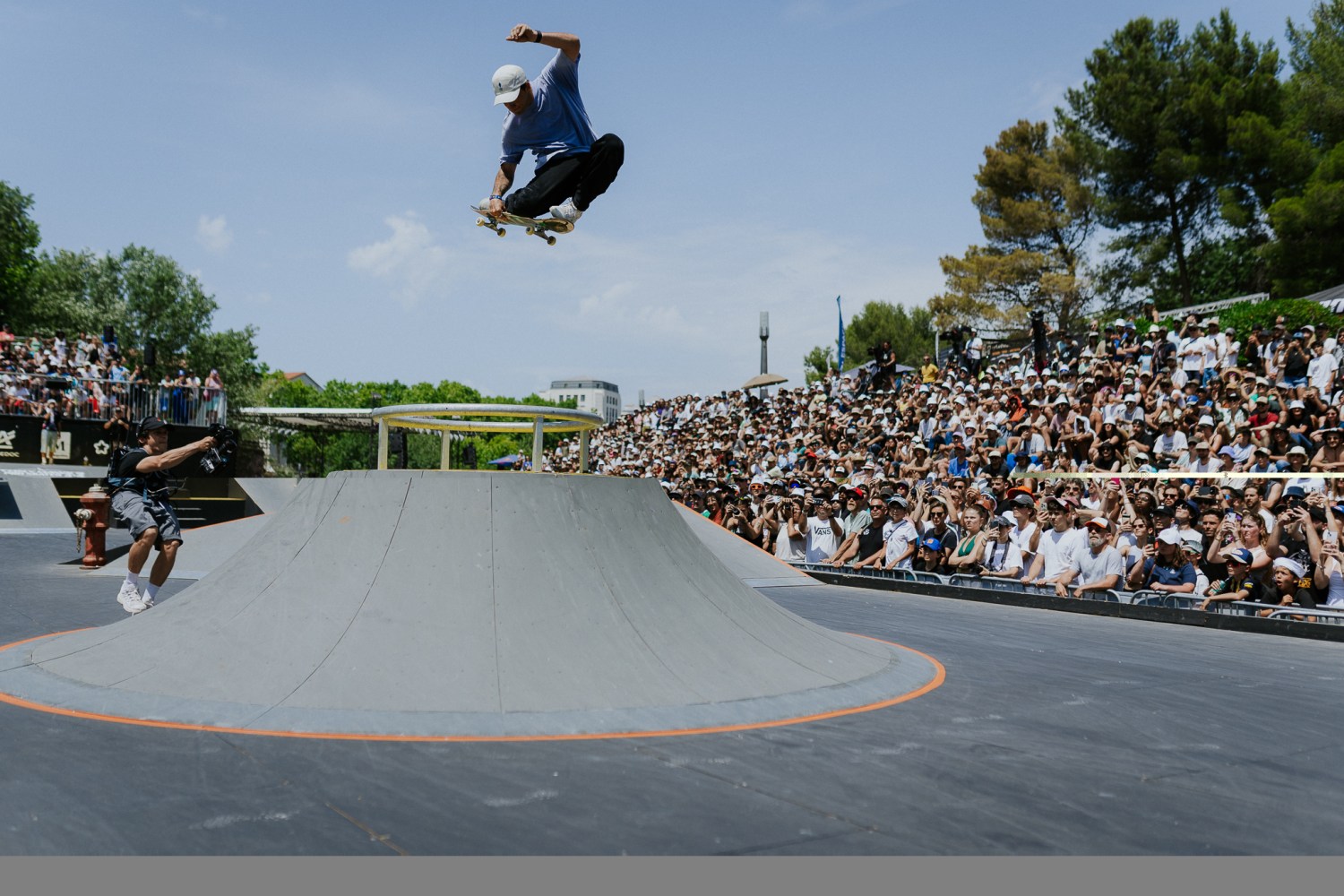 The world's biggest action sports festival is coming to Birmingham—how to win VIP tickets 2 Skateboarder performing a trick at an outdoor skate competition with spectators watching in the background