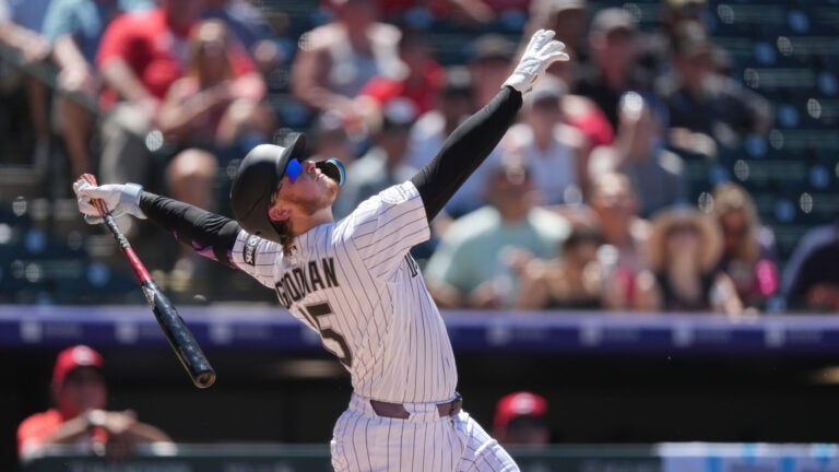 Colorado Rockies catcher Hunter Goodman (15) in the sixth inning of a baseball game Sunday, July 19, 2026, in Denver.