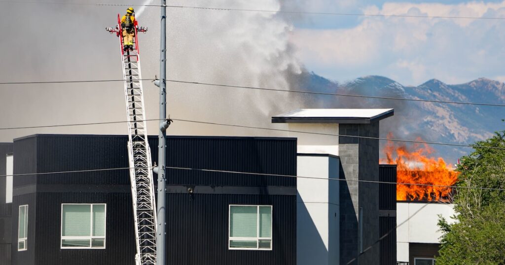Officials say mechanical issue likely caused blaze that displaced hundreds
