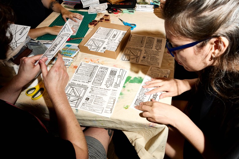 Zine enthusiasts work on zines at The Daily. Photo by Matt Ramey.