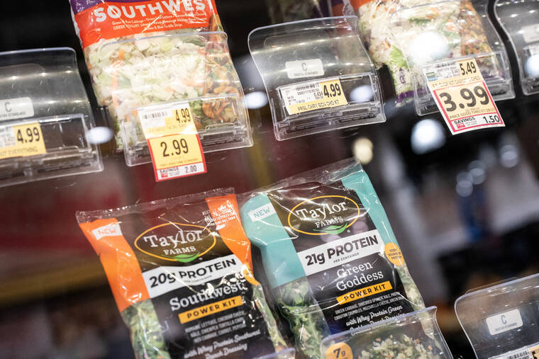 REUTERS/NATHAN HOWARD/FILE PHOTO
                                Taylor Farms products are displayed for sale, amid reports of slumping consumer confidence in lettuce and other fresh produce during the current cyclosporiasis outbreak that has sickened thousands across the U.S., at a grocery store in Washington, D.C., on July 24. Two people have died from cyclosporiasis in Michigan, the states health department said today, marking the first fatalities in the largest U.S. outbreak of the intestinal illness.