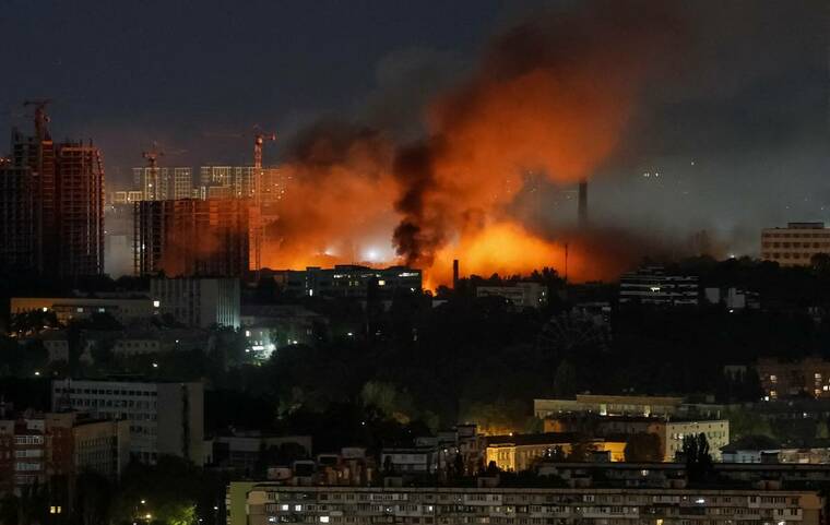 Russia pounds Kyiv with missiles, killing at least three