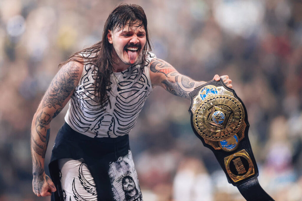 Dominik Mysterio celebrates winning the intercontinental championship during WWE WrestleMania 4 ...