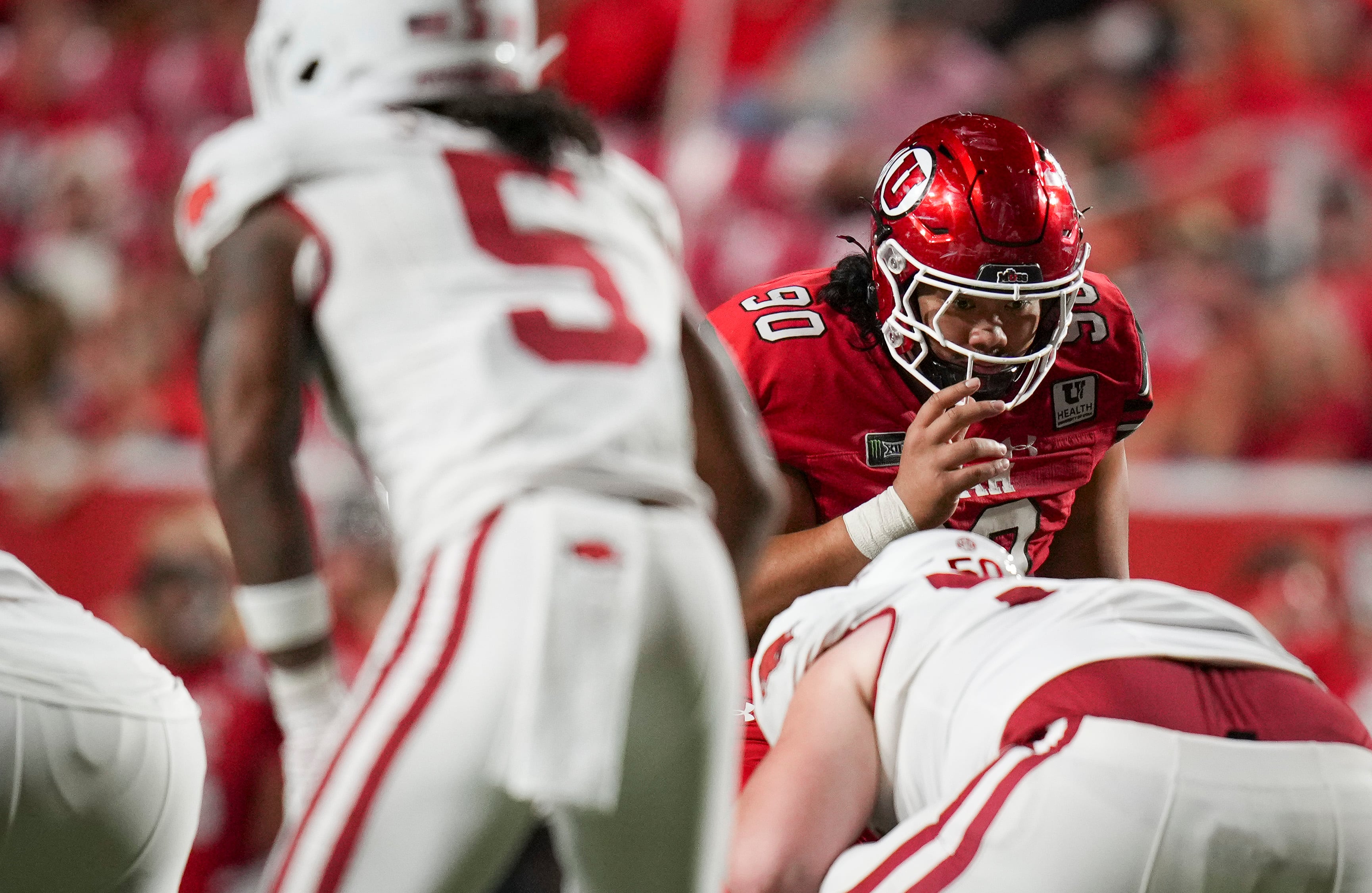 (Bethany Baker  |  The Salt Lake Tribune) Utah Utes defensive tackle Jireh Moe (90) prepares for the start of a play during the game between the Utah Utes and the Arkansas Razorbacks in Salt Lake City on Saturday, Sept. 12, 2026.