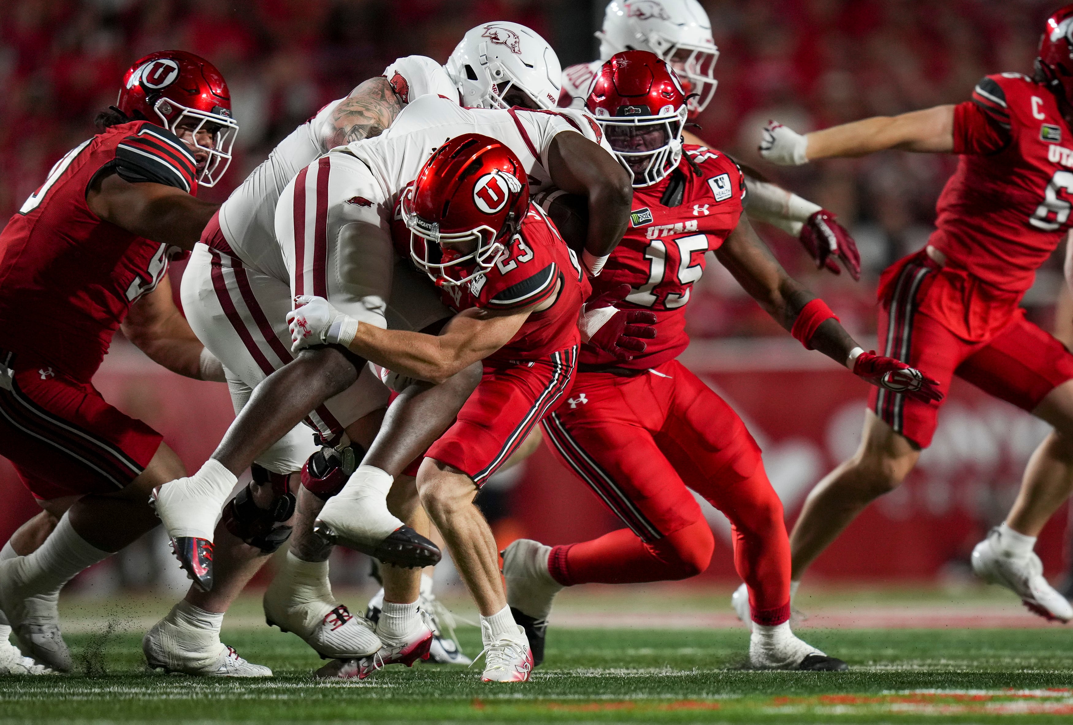 (Bethany Baker  |  The Salt Lake Tribune) Utah Utes tackle Arkansas Razorbacks defensive back LaMarcus Hicks (27) during the game between the Utah Utes and the Arkansas Razorbacks in Salt Lake City on Saturday, Sept. 12, 2026.