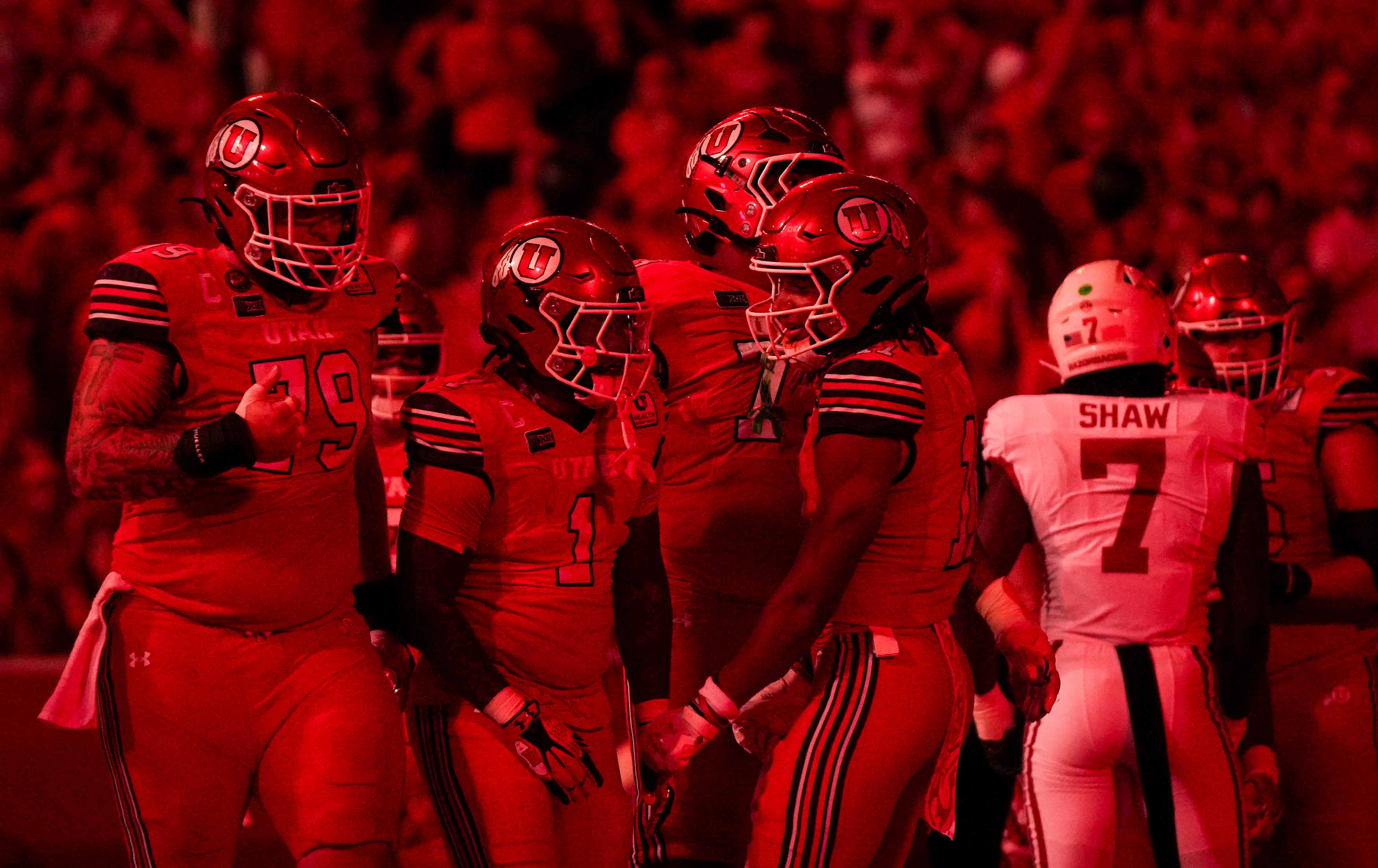 (Bethany Baker  |  The Salt Lake Tribune) Utah Utes celebrate a touchdown during the game between the Utah Utes and the Arkansas Razorbacks in Salt Lake City on Saturday, Sept. 12, 2026.