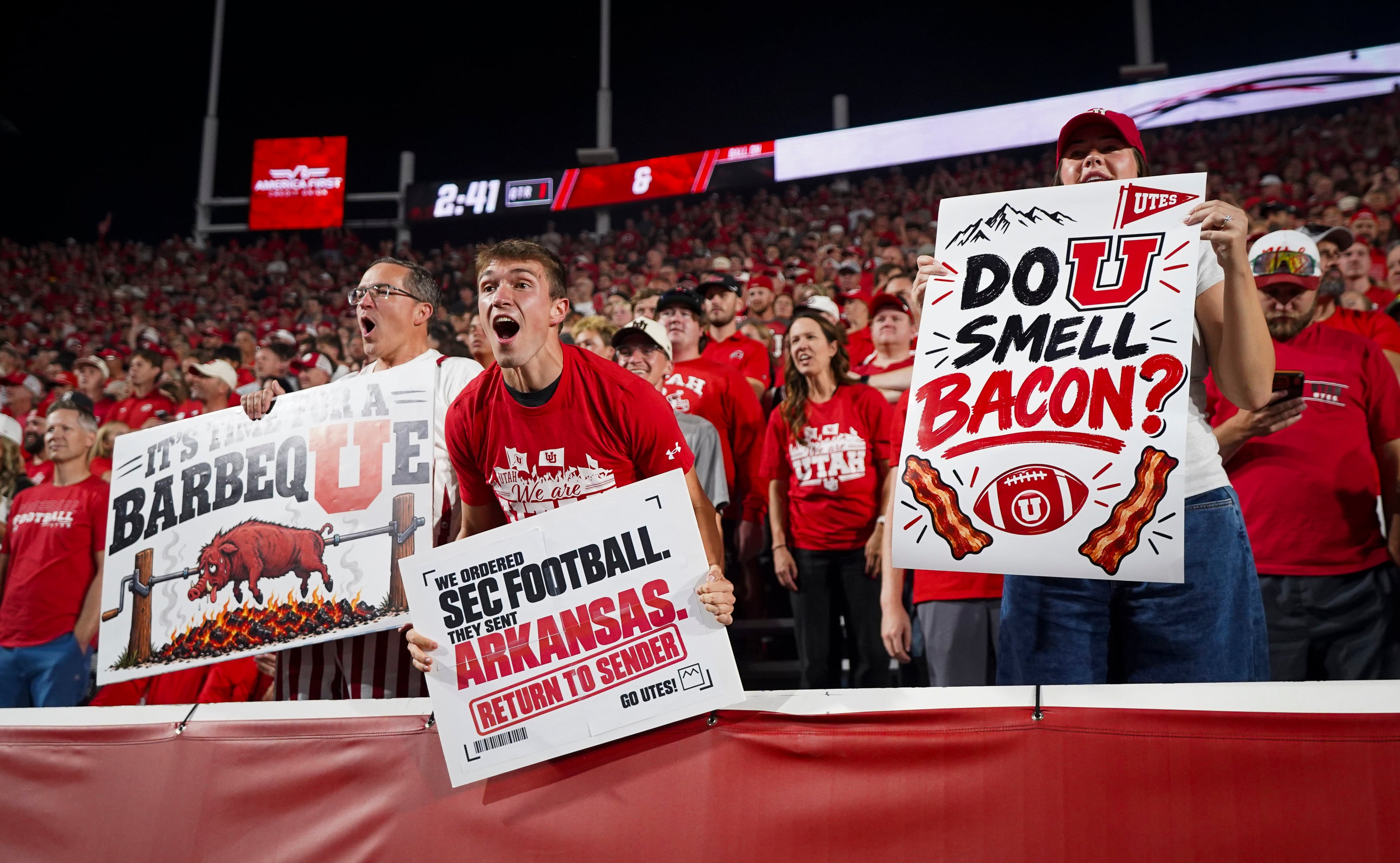 (Bethany Baker  |  The Salt Lake Tribune) Utah Utes fans yell as the Arkansas Razorbacks take the field before the game between the Utah Utes and the Arkansas Razorbacks in Salt Lake City on Wednesday, Jan. 1, 2020.