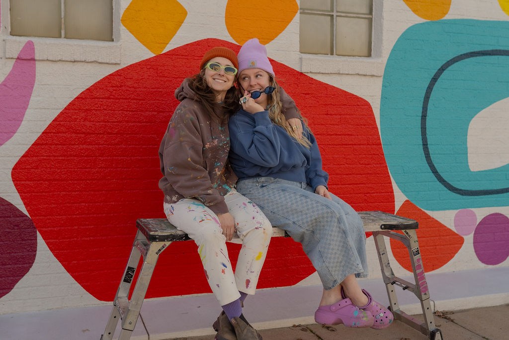30+ new murals will come to life at FREE Yonder Walls Festival—Oct. 17, 2026 5 Bendy Knees Design team in front of a painted wall