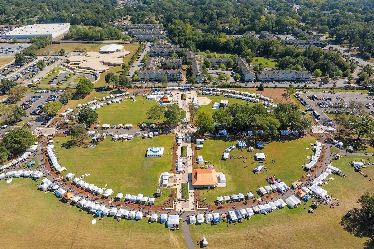 See how 270+ artists make Kentuck Festival a success + how to grab your tickets—Oct. 17 + 18, 2026 5 Aerial view of an arts festival.