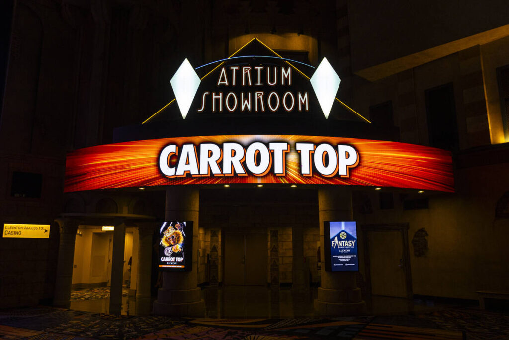 Signage for comedian Carrot Top is seen at the Atrium Showroom at Luxor on Monday, Sept. 21, 20 ...