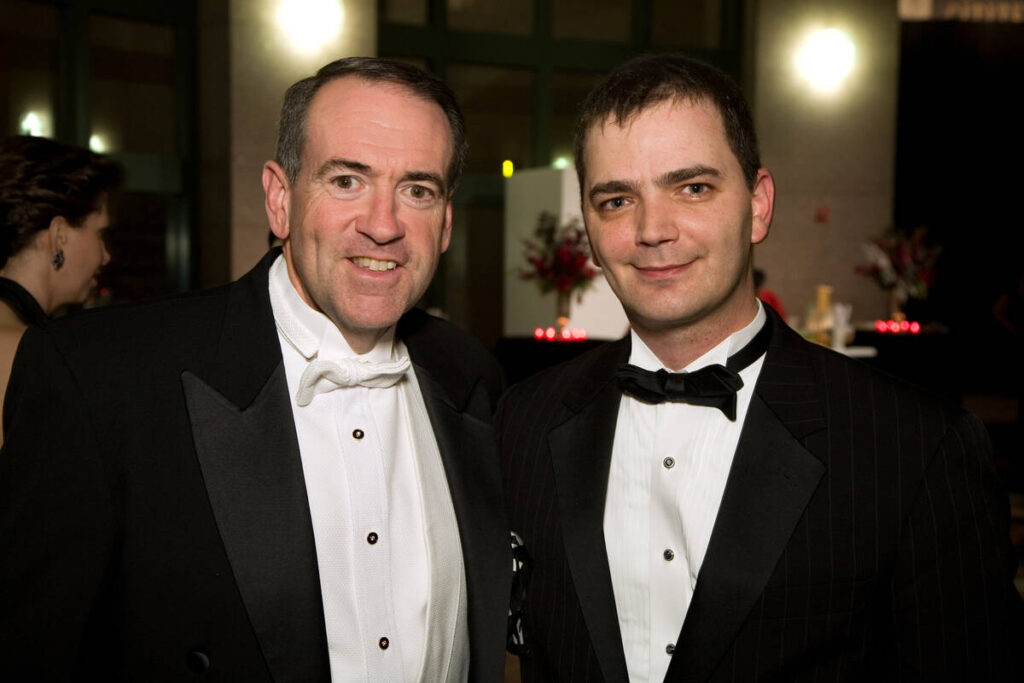 Mike Huckabee and Brian Evans (right) are shown in an undated photo. (Getty Images)